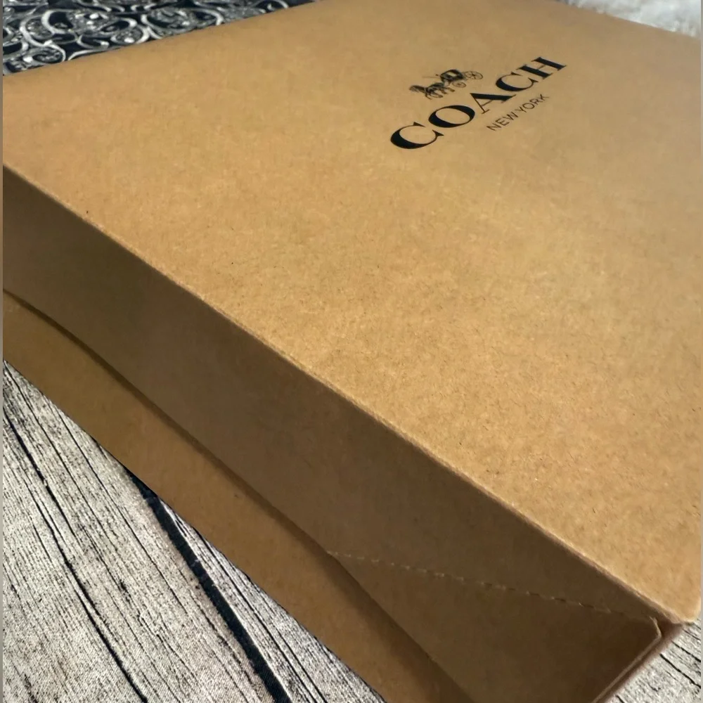 New. Coach large gift box + tissue paper. 10.5 x 12.5 x 4.5 in. Logo printed